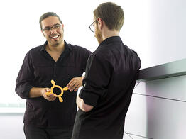 Employees are at the desk